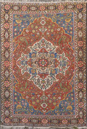 Grande tappeto a fondo blu con medaglione 