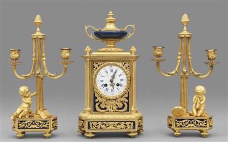 Trittico da camino in bronzo dorato e smaltato, 