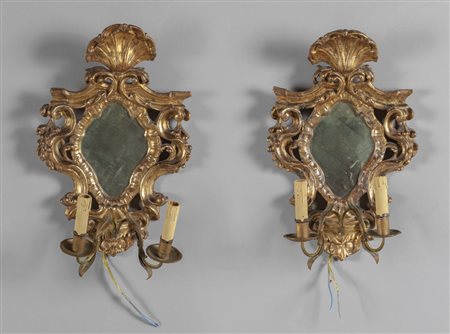 Coppia di apliques Luigi XIV in legno intagliato 