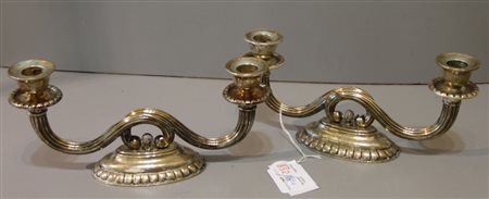 Coppia di candelieri in argento a due braccia
