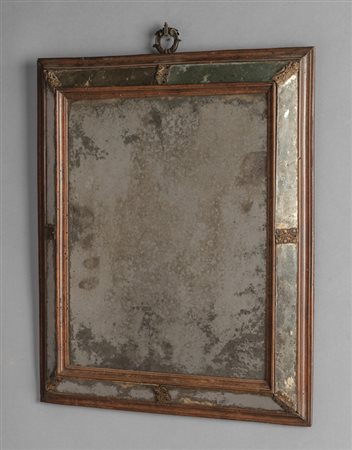 Specchiera Luigi XIV in noce con elementi in 