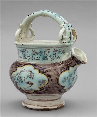 Versatoio con manico in maiolica, decorazione a 