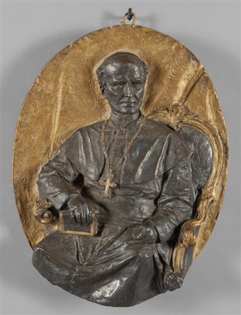 Placca di forma ovale in rame dorato e brunito 