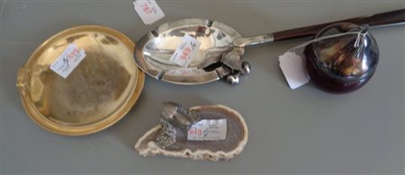 Quattro oggetti diversi in argento