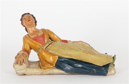 Puerpera, curiosa scultura in terracotta dipinta 