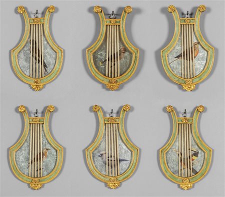 Sei specchierine in legno finemente intagliato e 