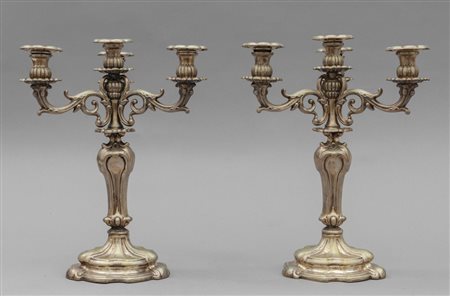 Coppia di candelieri a quattro luci in argento 