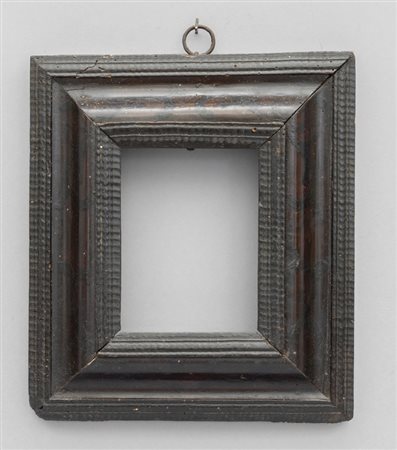 Cornice gouillochè Luigi XIV in legno ebanizzato 