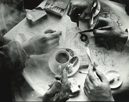 Frank Horvat (1928-2020)  - Hands of cartoonist André Francois, Terin, Folon, Siné at La Coupole, Paris, years 1950