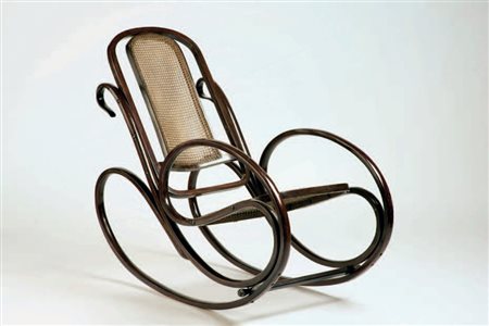 Antonio Volpe POLTRONA DONDOLO, 1914 In legno curvato e schienale e sedile...