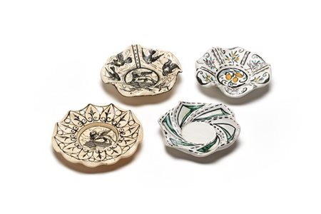 Umberto Bellotto Gruppo di quattro piattini in ceramica di forma costolata e con