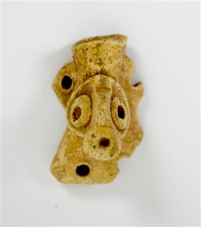 TESTA FEMMINILE DATAZIONE: 2.500-2.000 a. C. MATERIA E TECNICA: argilla...