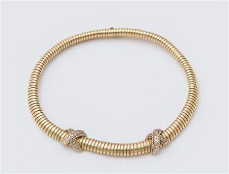 COLLANA TUBOGAS, en suite con l'anello, lotto 56. Collana in oro giallo 18K,...