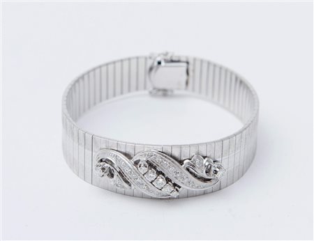 BRACCIALE A NASTRO IN ORO BIANCO 18K, realizzato come un nastro morbido a...