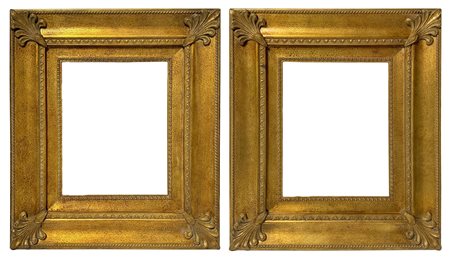 Coppia di cornici dorate, XX secolo. Misure interne cm 30x24 misure esterne...