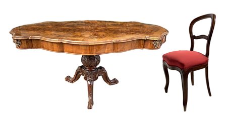 Tavolo e n 6 sedie. Tavolo in legno di noce allungabile, piano in radica di...