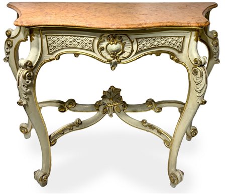 Console laccata e dorata nei toni del beige, inizi XX secolo, marmo al piano...