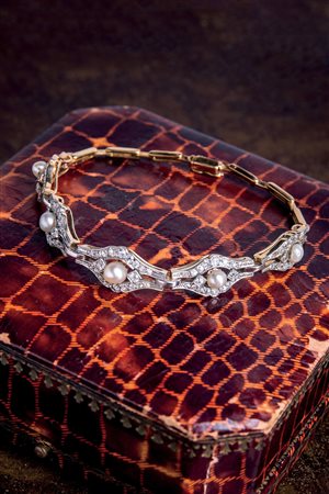 Bracciale in oro giallo e bianco 18 Kt