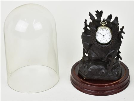 PORTA OROLOGIO IN LEGNO EBANIZZATO scolpito entro campana in vetro, h cm...