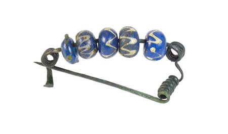 FIBULA DATAZIONE: V sec. a. C. MATERIA E TECNICA: bronzo laminato e...