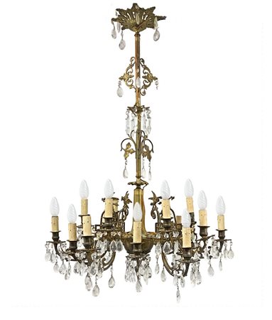 Antico lampadario in ottone a 18 luci con brindoli in vetro molato, XIX...