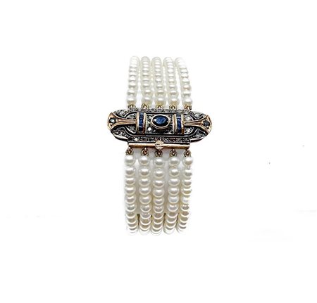 Bracciale con perline/fiume e chiusura in oro /basso arg. Zaff.