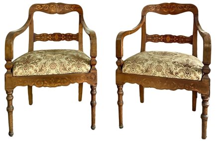 Due poltrone Biedermeier intarsiate, in legno chiaro. H cm 90. Seduta H cm...