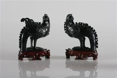 MANIFATTURA ORIENTALE DELLA PRIMA META' DEL XX SECOLO Coppia di pappagalli....