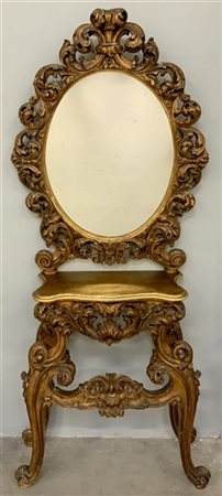 Console con specchiera in legno scolpito e dorato, a volute e motivi fogliacei.