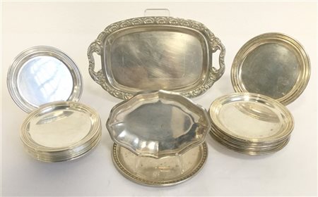 Gruppo di ventuno piattini in argento e metallo argentato (gr 350 ca)
