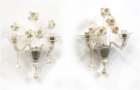 Venini Due lampade da parete a due luci in vetro trasparente incolore decorate c