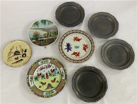 Lotto composto da quattro piatti in peltro, uno con veduta del Lago Maggiore e