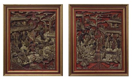 Coppia di pannelli in legno intagliati e parzialmente laccati raffiguranti pers