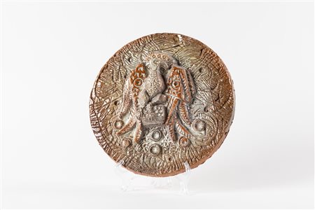 Formella in ceramica invetriata con aquila ad ali spiegate