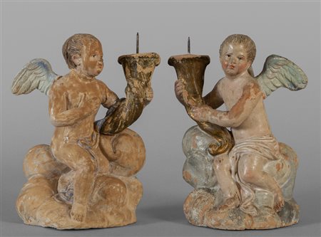 Coppia di angioletti portacornucopia in 