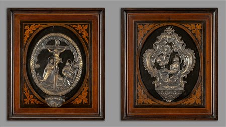 Due acquasantiere in argento raffiguranti 