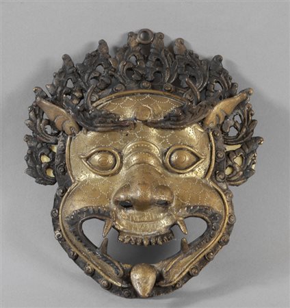 Maschera indonesiana in bronzo sec.XIX<br>cm. 