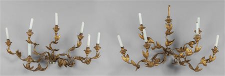 Coppia di bracci a sei luci in legno intagliato e 