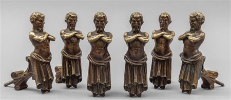 Sei maniglie in bronzo dorato raffiguranti 