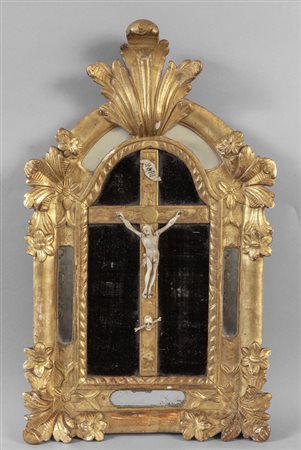 Crocefisso in avorio, cornice in legno intagliato 