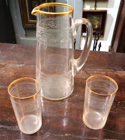 Brocca con sei bicchieri e vassoio in cristallo 