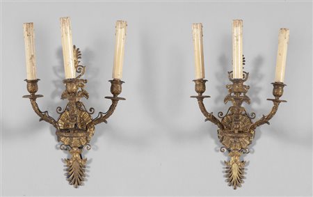 Coppia di apliques in bronzo dorato con cigni che 