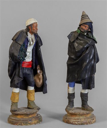 Popolani, coppia di sculture in terracotta 
