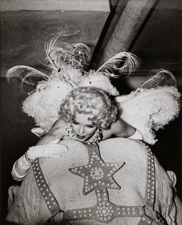 Weegee (1899-1968)  - Marilyn Monroe on elephant, years 1950