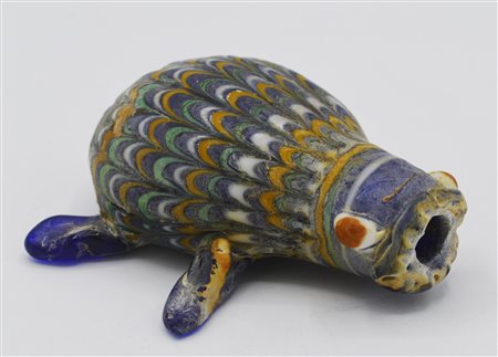 UNGUENTARIO CONFIGURATO DATAZIONE: IV-III sec. a. C. MATERIA E TECNICA: pasta...