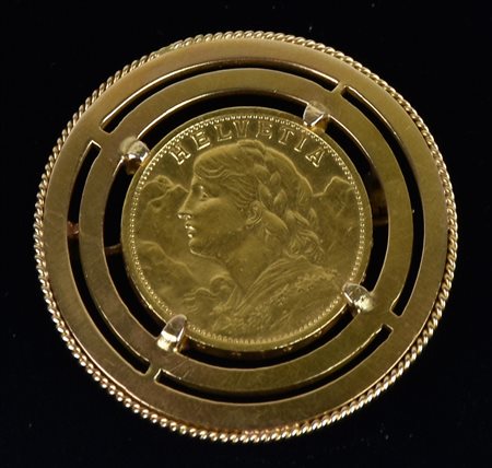 SPILLA IN ORO GIALLO contenente Marengo svizzero anno 1912 diam 36 mm peso g...