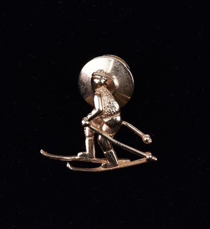 SPILLA IN ORO GIALLO raffigurante sciatore g 3,3 IL PRESENTE LOTTO E'...