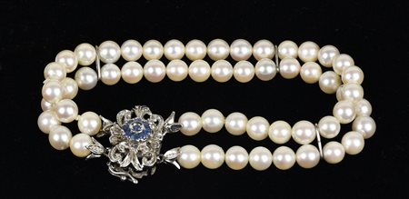 BRACCIALE A DUE FILI DI PERLE COLTIVATE fermezza in oro bianco con piccoli...