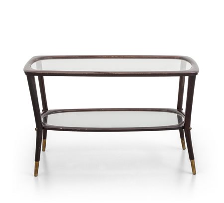 UN TAVOLINO, anni '50. <br>Legno di mogano, 