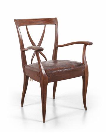 UNA POLTRONCINA, anni '50. <br>Legno di mogano, 